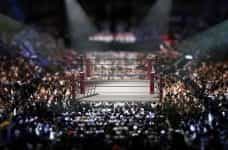 A boxing ring in a packed out venue.