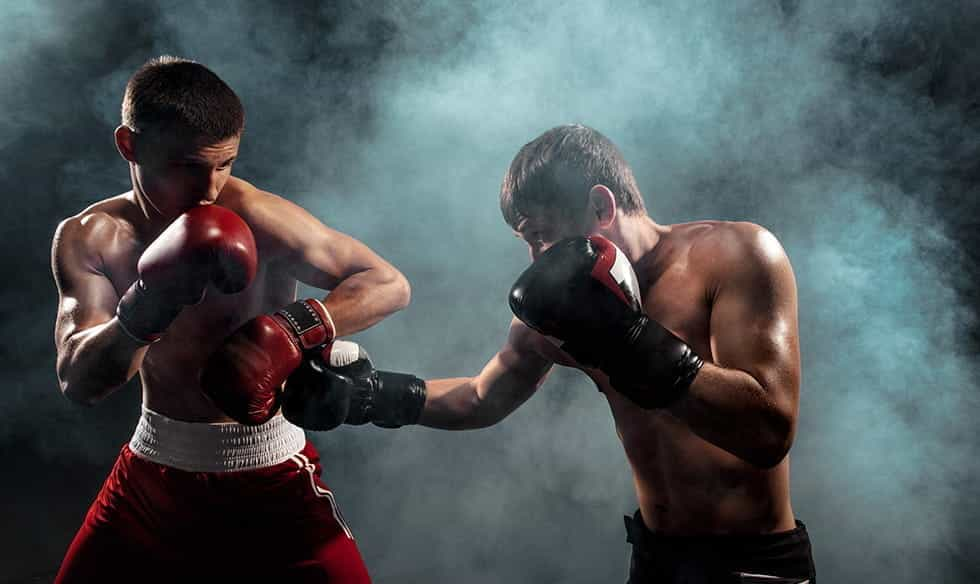 Two boxers fighting.