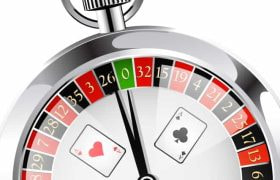 A stopwatch with a roulette wheel inside and playing cards imposed on the face.