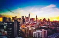 Chicago city skyline with skyscrapers at sunset.