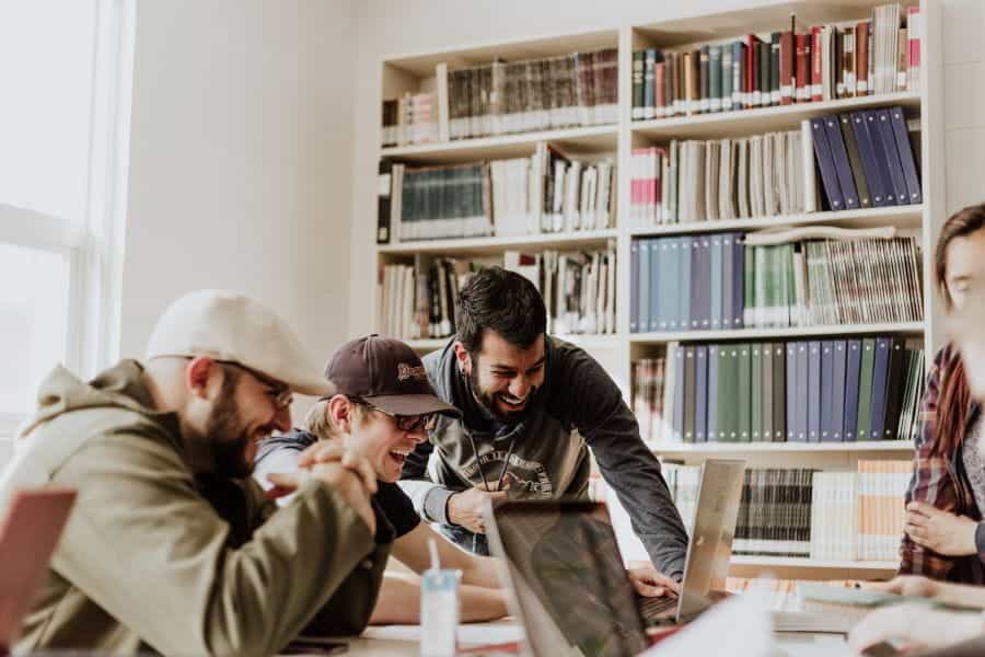 Happy people working on a project together.