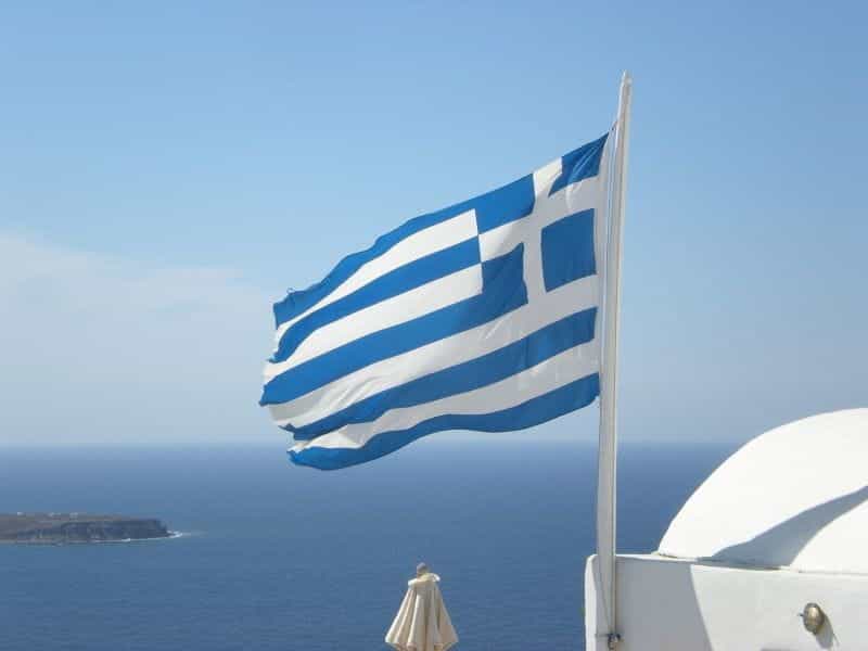 The Greek flag flying in Santorini.