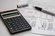 Balance sheet and calculator.