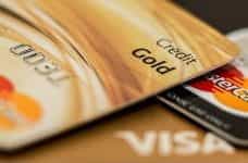 A pile of gold credit cards.