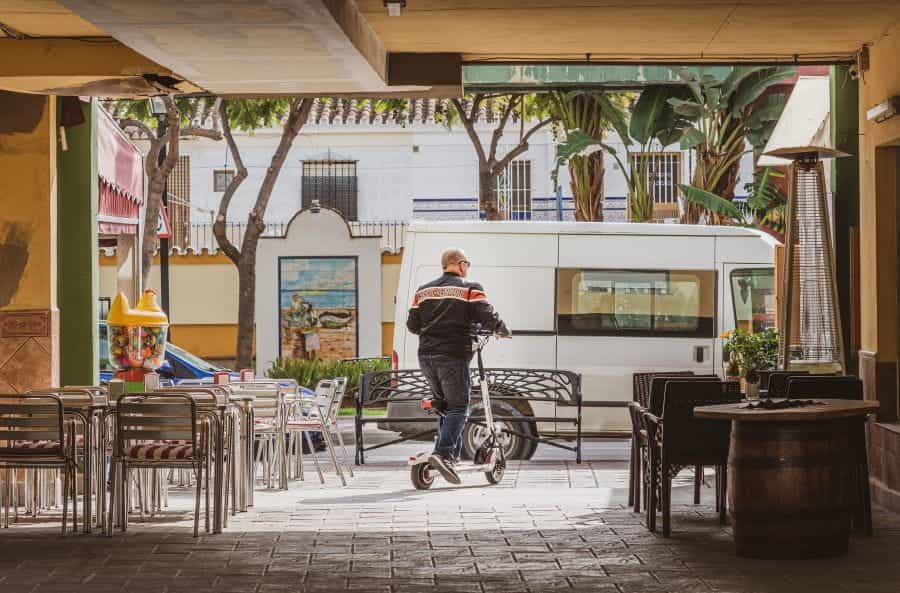 A sunny alleyway between restaurants in Fuengirola, Spain.