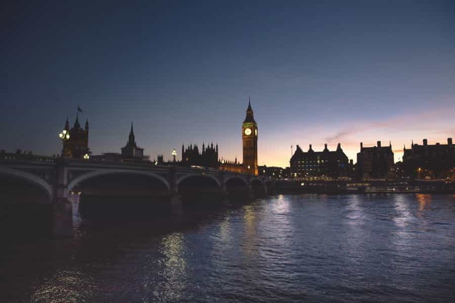 London bridge and the Houses of Parliament at night.