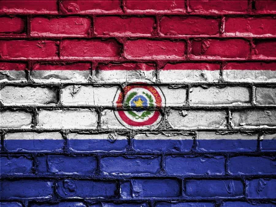 The flag of Paraguay painted on a brick wall.