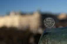 Swedish money with Stockholm in the backdrop.