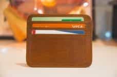 A small leather wallet containing bank cards.