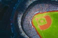 Baseball stadium at night from above.