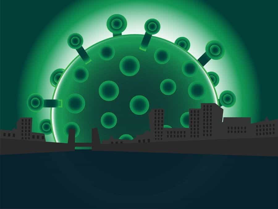 A massive green coronavirus molecule looms over a darkened city.