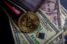 Cryptocurrency and cash.