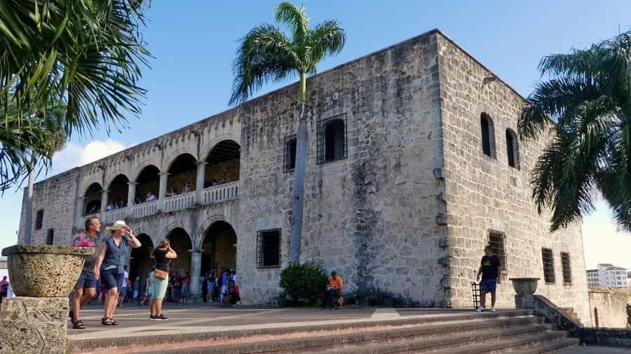 Tourists at a historic site in Santo Domingo, Dominican Republic.