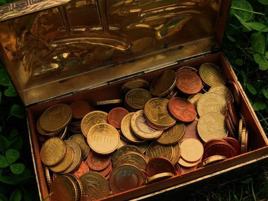 A treasure chest full of European coins.