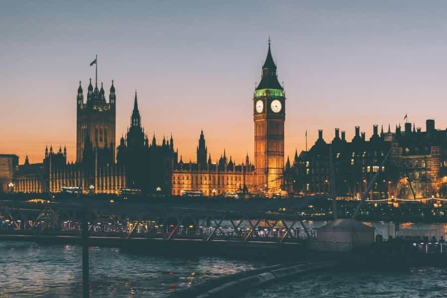 The Houses of Parliament lit up at night.