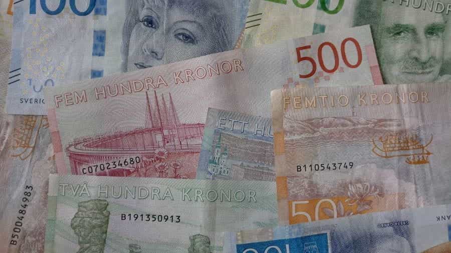 A pile of Swedish Kronor notes.