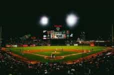 A packed baseball stadium in San Francisco, California at night.
