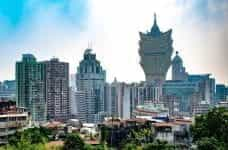 Buildings and trees in the Macau skyline.