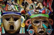 Colorful painted wooden masks in Mexico.