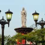 A monument of a woman in a flowing dress in Maracaibo, Venezuela.