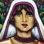 A mural of a woman wearing a head scarf in front of blooming cacti in San Pacho, Mexico.