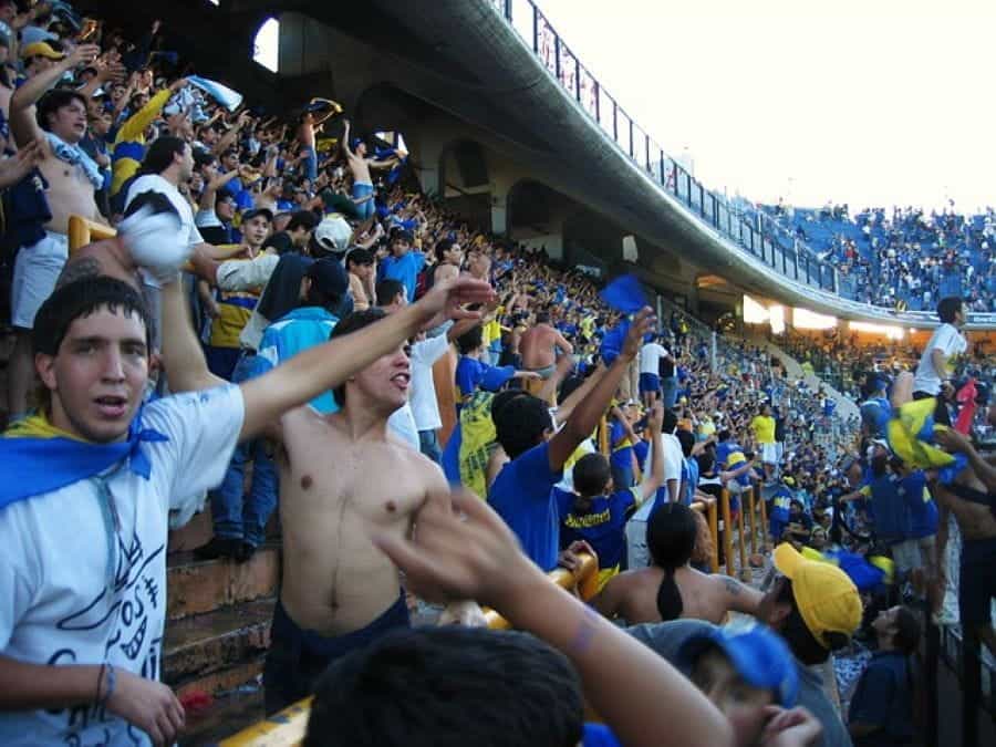 A packed stadium of enthusiastic soccer fans in Buenos Aires, Argentina.