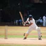 Cricket player swing.