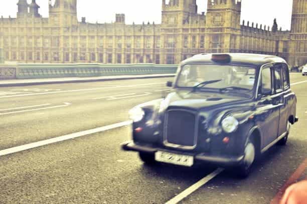 A London taxi passing Westminster.