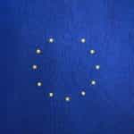 The EU flag with a star missing.