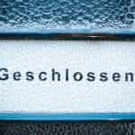 A sign displaying the word geschlossen, German for closed.
