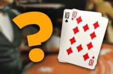 A question mark next to playing cards - a pair of tens.
