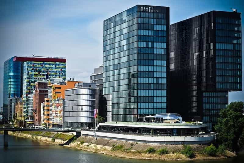 The German city of Düsseldorf’s media harbor, featuring towering and sleek skyscrapers and modern developments.