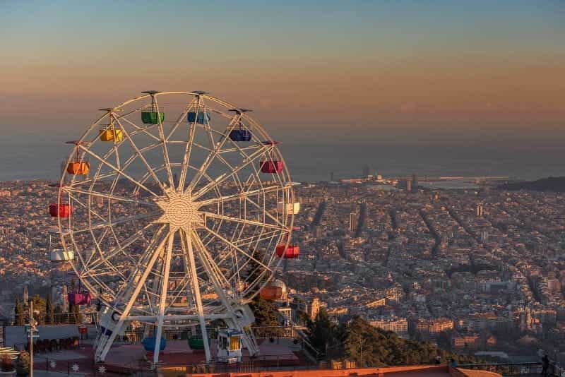 The Tibidabo ferris wheel stands above the Barcelona skyline.