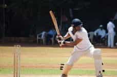 Cricket player swing.