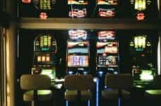 A row of slot machines in a casino.