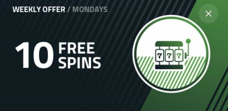 A circle with a slot icon inside and the words "10 Free Spins".