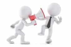 An anonymous figure yelling into a megaphone, which is being pointed at another figure.