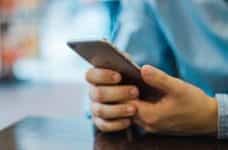 A person using a mobile phone.