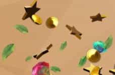 Stars, leaves, gems and coins on a beige background.