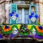 Mardi Gras decorations on a balcony in New Orleans, Louisiana.