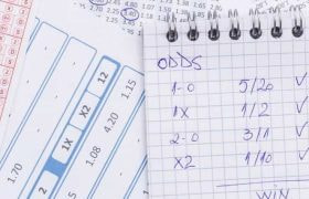 Odds written on sheets of paper.