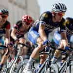Cyclists racing competitively.