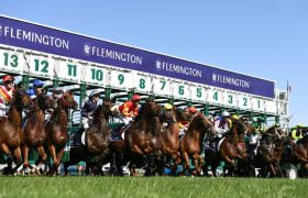 Horses burst from the starting stalls at Melbourne’s Flemington Racecourse. &copy;GettyImages