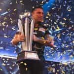 Gerwyn Price with the world championship trophy.
