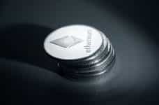 Silver Ethereum cryptocurrency coins.