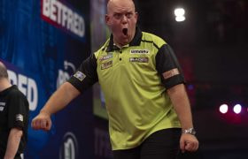Michael van Gerwen puts on his crazy face.