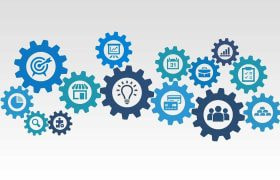 Cogs with different icons overlaid.