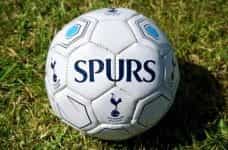 A football with the word SPURS and the Tottenham Hotspur logo.