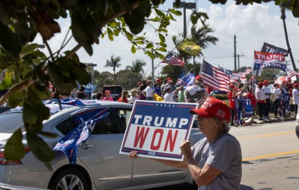 A Trump supporter protests her man won after the 2020 election result.