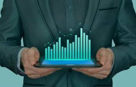 A person in a suit holding a bar chart showing both growth and dips.